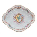 Chinese export famille rose fluted lozenge-shaped armorial porcelain dish, with the crest of
