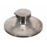William Neale & Son Ltd. Capstan silver ink well, with a hinged cover and porcelain liner,