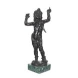 After Donatello - bronze figure of Atys-Amorino, mounted upon a veined green marble square socle,