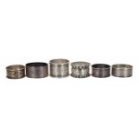 Group of six silver napkin rings, including a pair by William Devenport, Birmingham 1918, 4oz t in