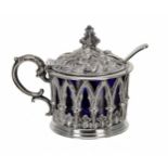 Victorian silver drum mustard, with a hinged cover and cast open arcaded surround enclosing a blue