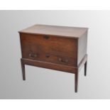 18th century oak blanket chest on stand, the hinged top enclosing a candle box over a single drawer,