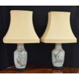 Pair of Chinese famille rose porcelain baluster vases converted to table lamps, with applied iron