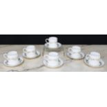 Set of six Royal Worcester 'Saguenay' coffee cans and saucers, the saucers 4.75" diameter