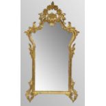 Ornate Rococo giltwood shaped wall mirror, 42" high, 22" wide