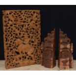 Pair of decorative an intricately carved wooden book ends, possibly Balinese, depicting Gapura,