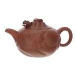 Chinese Yixing red ware teapot and cover, with dragon relief decoration, the cover with an