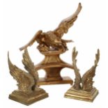 19th century carved giltwood eagle, modelled with outstretched wings upon a shaped plinth, 16" high;