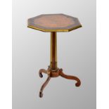 Regency burr elm and brass mounted tripod octagonal occasional table, upon a tapering column with