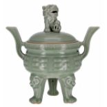 Chinese celadon glaze porcelain tripod censer and cover, with a 'Dog of Fo' finial, 20th century,