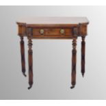 George IV mahogany side table in the manner of Gillows, the shaped break front top with ebony