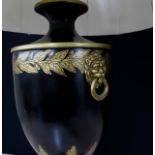 Decorative Toleware style composite table lamp, modelled as an urn with fixed cover and lion mask