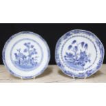 Pair of Chinese export blue and white porcelain circular plates, decorated with boats in a landscape