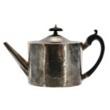 George III silver oval teapot, with engraved crest and hardwood handle and finial, maker Michael