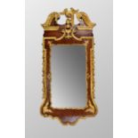 Good George II walnut and parcel gilt wall mirror, 51.25" high, 24" wide