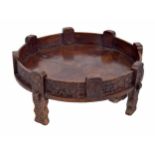 Traditional Indian Chakki carved low circular coffee table, the raised rim profusely decorated