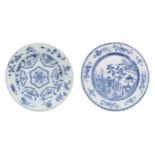 Chinese blue and white porcelain plate, depicting a landscape with a man riding a water buffalo,