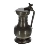 Antique pewter lidded flagon, the fixed hinged cover with a twin-acorn finial, stamped