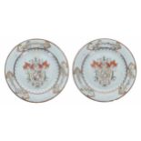 Pair of Chinese export famille rose armorial porcelain circular plates for the French market, the