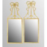 Good pair of decorative gilded rectangular wall mirrors, each with later applied carved giltwood