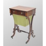 Regency rosewood work table, the rectangular top over a single frieze drawer and green pleated