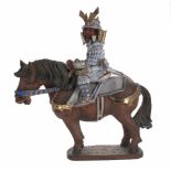 Impressive large Chinese stoneware glazed figural group, modelled as a warrior astride a horse