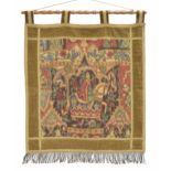 Tapestry wall hanging depicting a King on horseback, under a swag of Latin verse on a floral