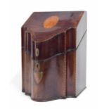 George III mahogany serpentine knife box, the hinged cover with chevron inlay banded borders and