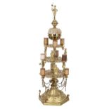 Victorian lacquered brass bobbin holder, raised in four stages with some original bobbins and the