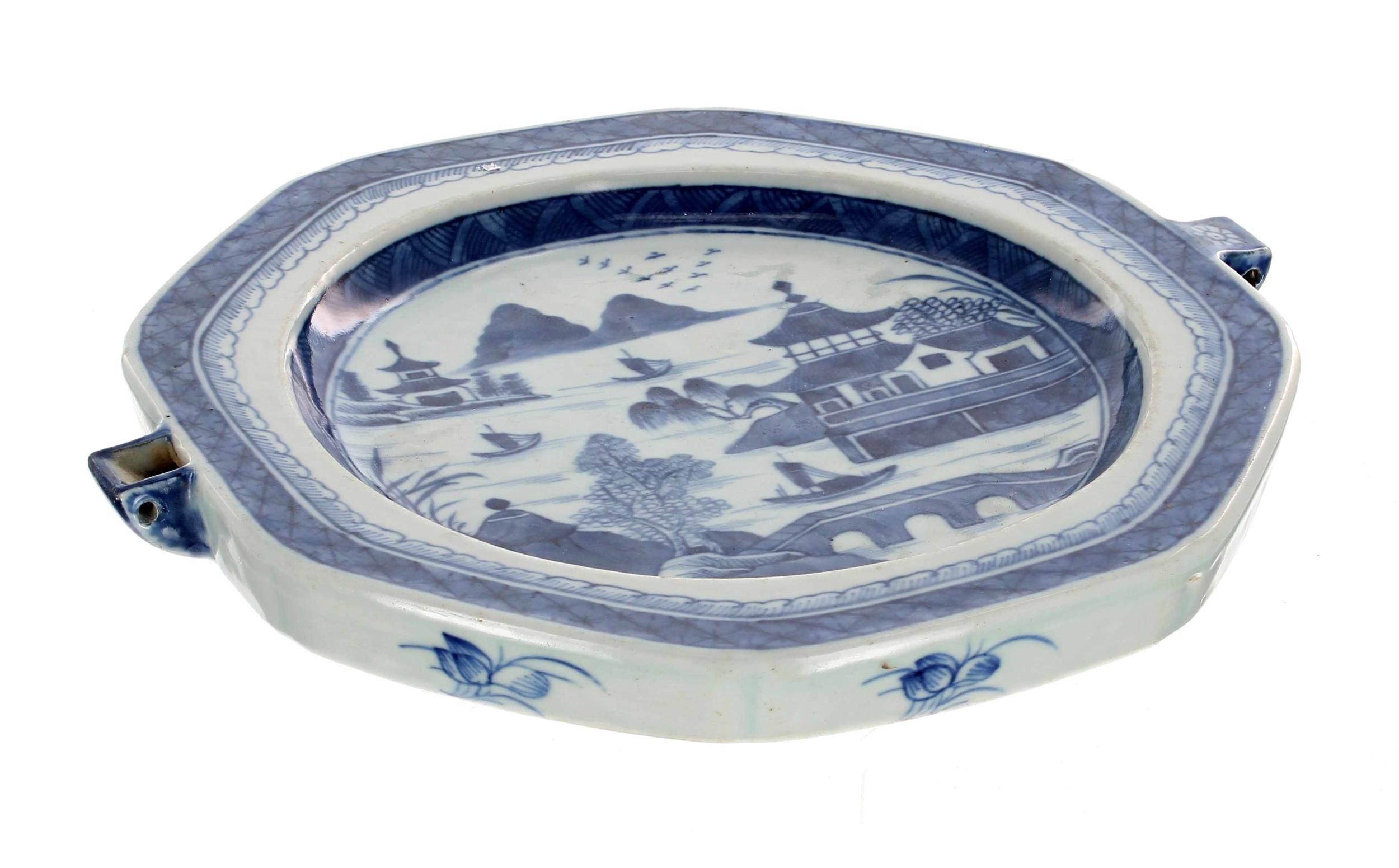 Pair of Chinese export blue and white export porcelain octagonal warming plates, decorated with