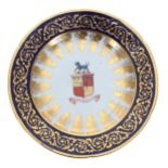 French 19th century porcelain armorial cabinet plate, with a painted shield crest with Latin