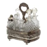 George IV silver oval cruet stand, with repoussé scrolling decoration and a hardwood base,
