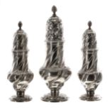 Set of three George III silver casters by Robert Peaston, of baluster form with wrythen spiral