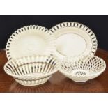 19th century oval creamware basket on stand with weave designs, the basket 9.5" wide; with another