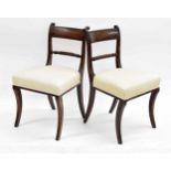 Pair of Regency mahogany dining chairs, with inlaid horizontal top rails over rope twist splats,