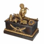 French 19th century bronze and ormolu figural inkstand, the rectangular cover mounted with a