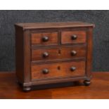19th century mahogany apprentice miniature chest of two short over two long graduated drawers,