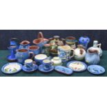Selection of Torquay pottery to include Kingfisher tea cups, pots and jugs, stem 'udder' vases, some
