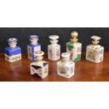 Selection of seven Continental porcelain scent bottles with stoppers, including a Sevres type, all