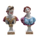 Pair of Capodimonte porcelain figural busts depicting a gentleman in bi-colour armour, and a