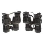 Two pairs of British Army Avimo 7x42 L11A1 binoculars, within rubberised shell casing (2)