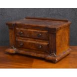 Good figured walnut desk top miniature chest of two drawers, with architectural reeded pillars