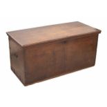 19th century mahogany blanket chest, the hinged cover revealing an open interior with candle box,