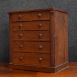 Victorian miniature oak Wellington specimen chest of five drawers, the drawers currently with card