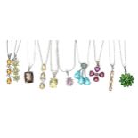 Ten modern silver gem set pendants upon slender silver chains