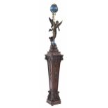 Good French bronzed mystery clock, the movement housed in a powder blue globe casing over a pendulum