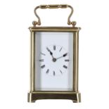 Carriage clock timepiece within a corniche brass case, 5.75" high