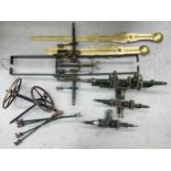 Quantity of various turret clock movement parts; also a pair of large gilt painted turret clock
