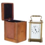 Carriage clock timepiece within a corniche brass case, 5.75" high (key); also with outer Morocco