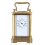 Miniature carriage clock timepiece within a corniche gilded brass case, 3.75" high